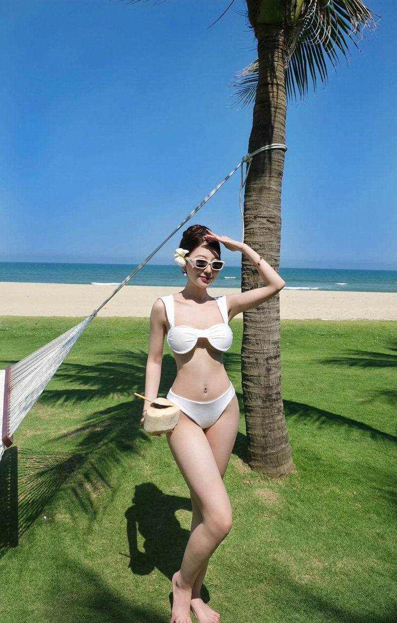 Gái xinh vú to mặc bikini hồng ngọt ngào gợi tình